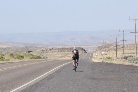 Helen on the road, with nothing in sight.