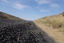 Roadside gravel and the sky